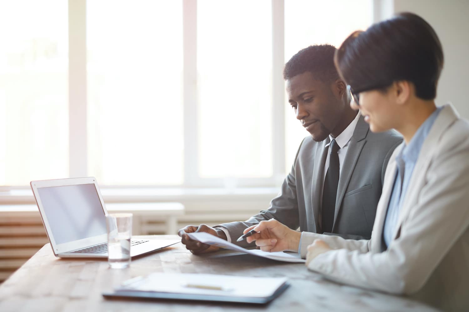 Two Business People Working Important considerations when selecting the right Certification Body